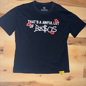 Trendy Black Graphic Tee with Lip Print